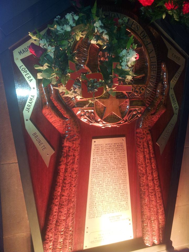 The wreath alongside the memorial plaque 