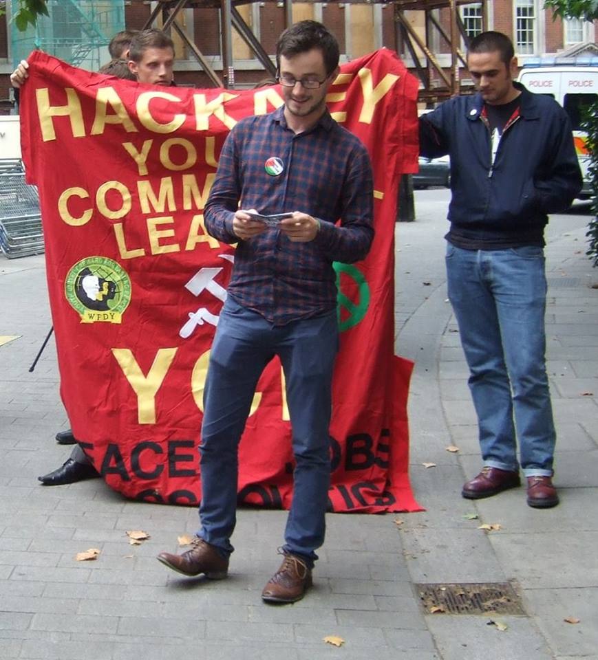 Julian Jones, YCL Executive Committee member speaking at the picket of the US embassy in London